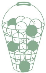 A wire basket filled with golf balls, some shaded darker than others, on a plain background.